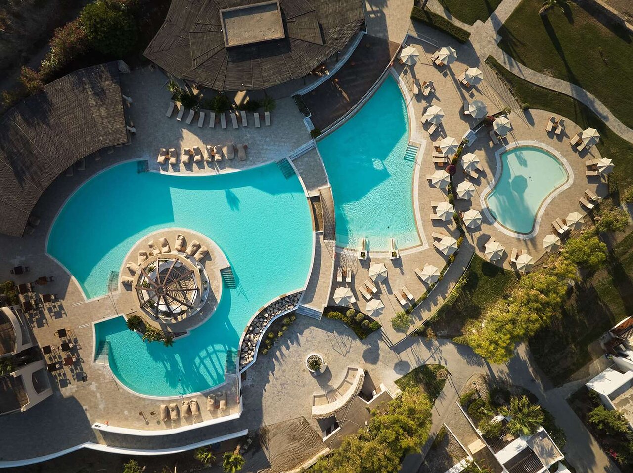 Skats uz baseinu pie Lindian Village Beach Resort Rhodes, Curio Collection by Hilton. panoramic view with beach and pools