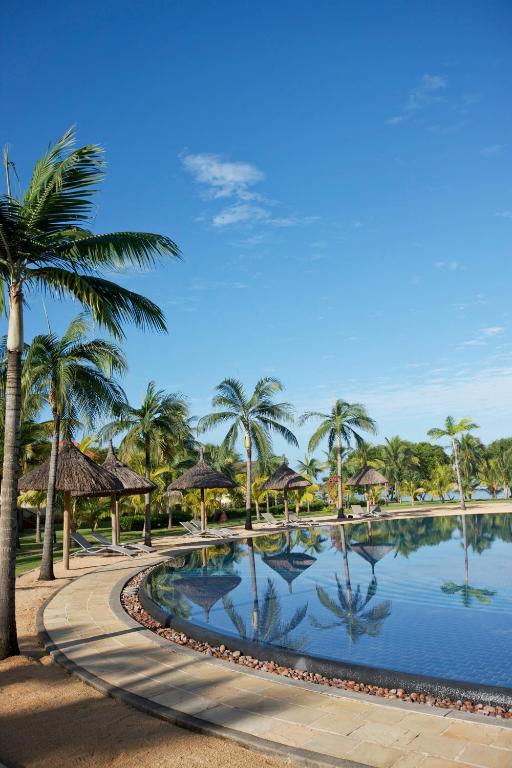 Miera oāze pie Tamassa Bel Ombre ar palmām un baseinu