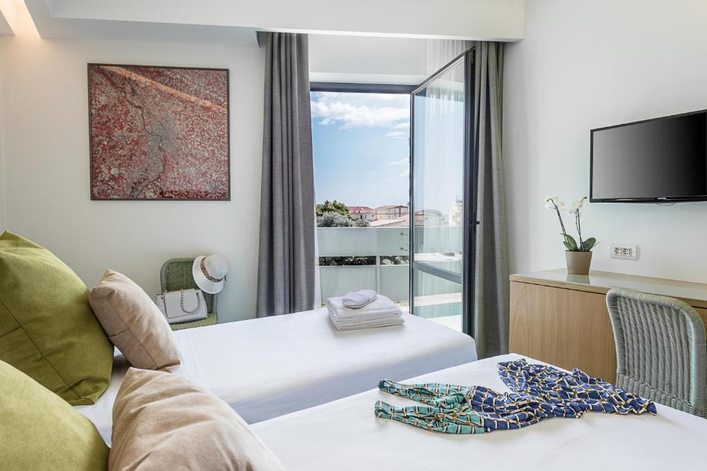 Numurs ar balkonu un skatu Rada Siri Hotel