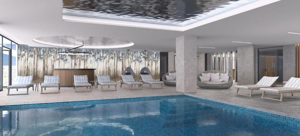 Mūsdienīgs spa ar iekštelpu baseinu, ērtām sauļošanās krēslām un relaksējošu atmosfēru. Interjera dizains ietver dabas elementus un mūsdienīgas detaļas.