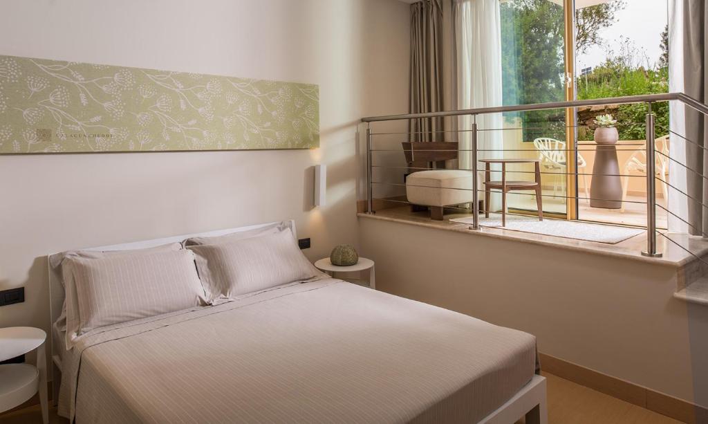 Numurs ar terasi viesnīcā Cala Cuncheddi