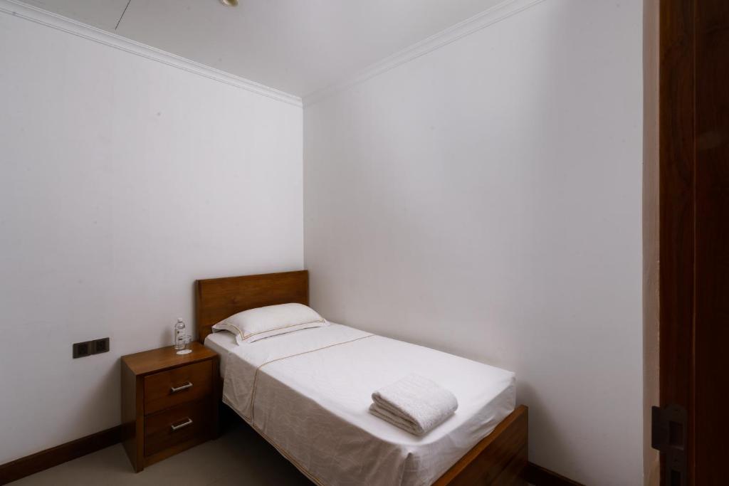 Numurs ar vienvietīgu gultu Araliya Beach Resort & Spa.