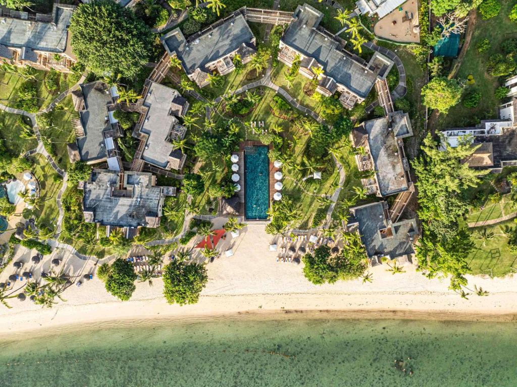 Hilton Mauritius Resort & Spa piekrastē ar baseinu un dārziem