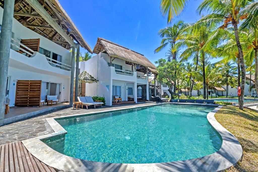 Seasense Boutique Hotel & Spa ar baseinu un tropu dārzu