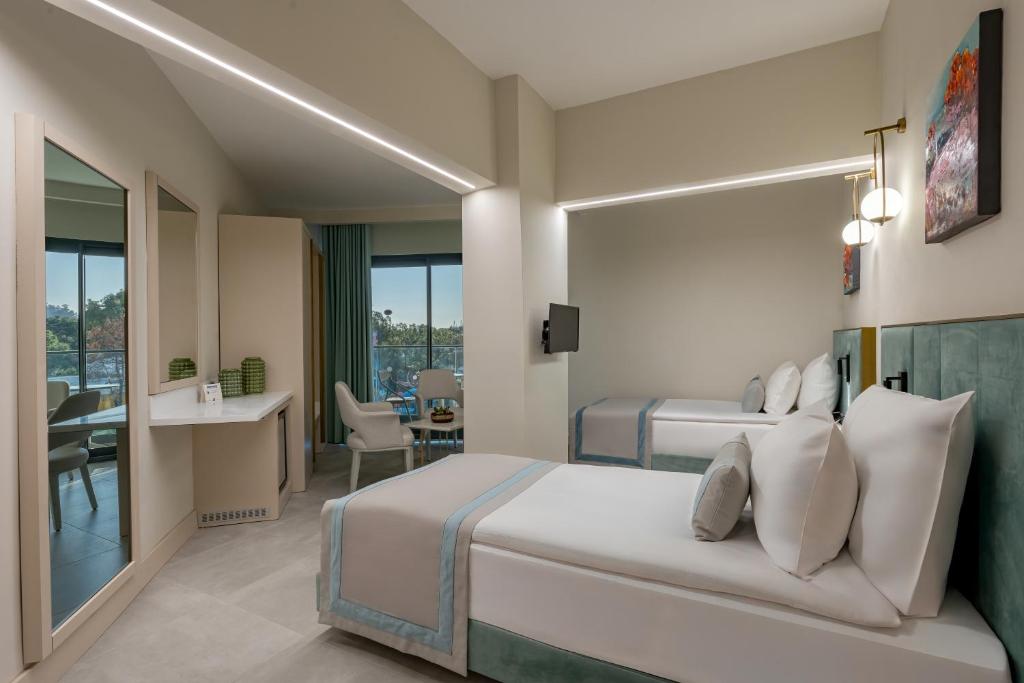 Moderns numurs Bergiz Hotels & Resort Kemer ar skatu uz dabu
