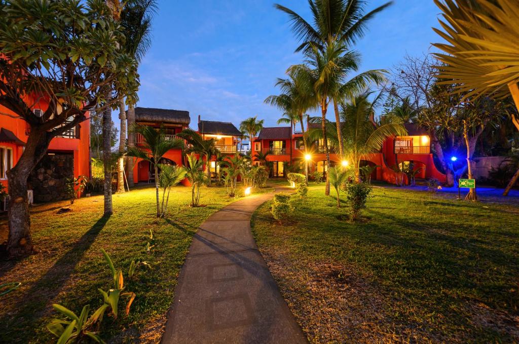 Viesnīca Flowers of Paradise tropu dārzā krēslā.