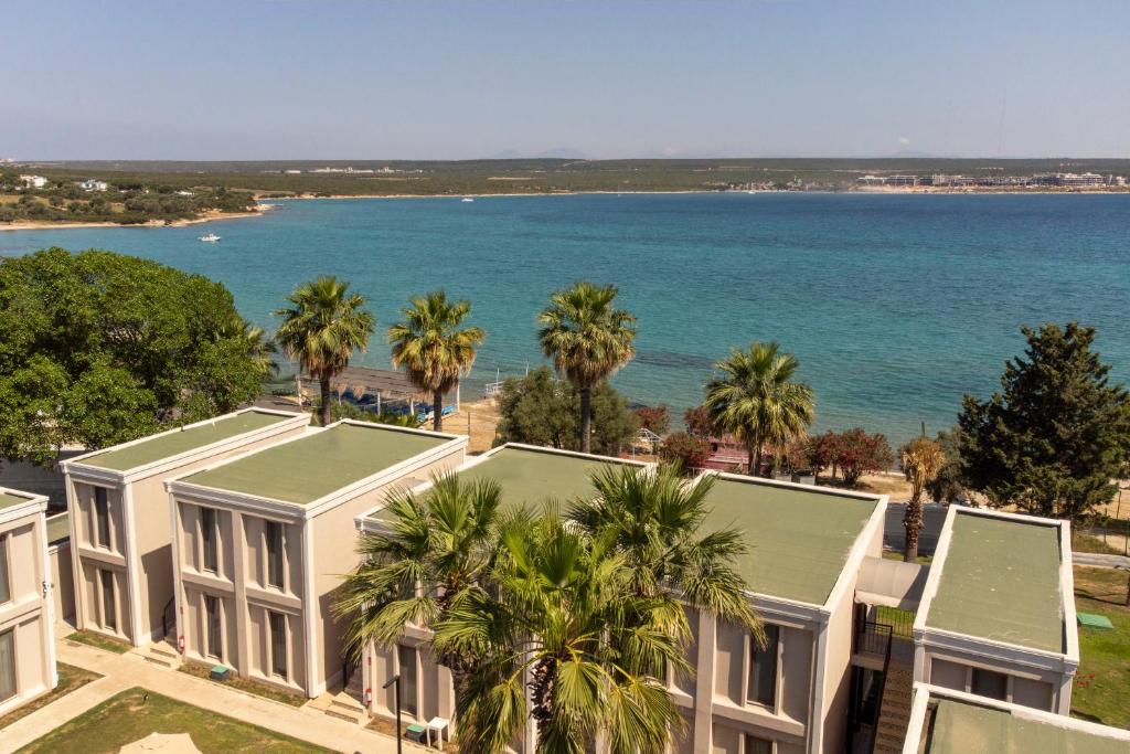 Viesnīca Duja Didim piekrastē ar palmas un skatu uz jūru