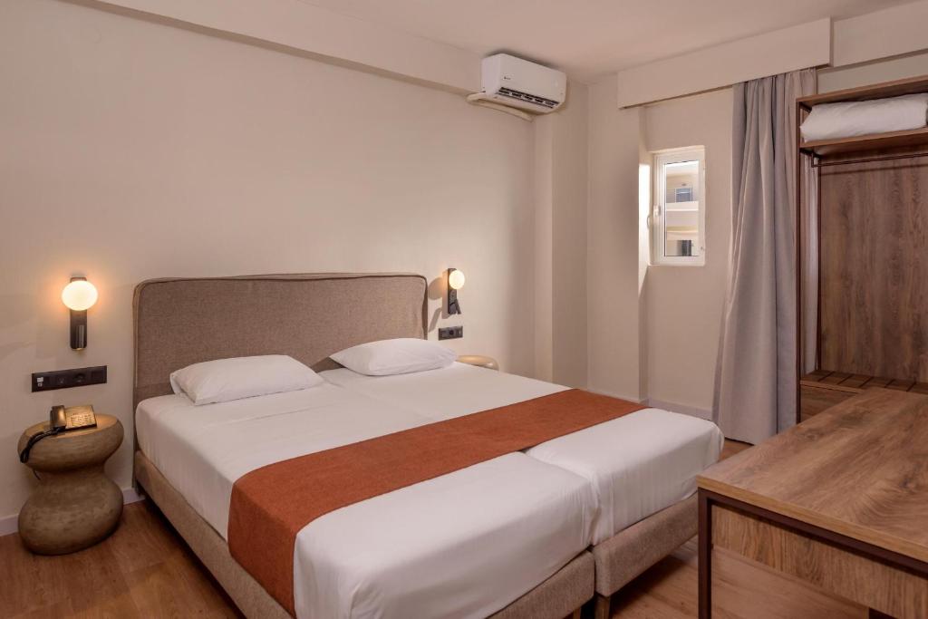Moderns numurs ar divguļamo gultu viesnīcā Zeus Hotels Ydoria Resort.