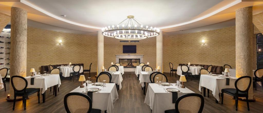 Elegant dining area at Mirage Park Resort with soft lighting and refined decor.