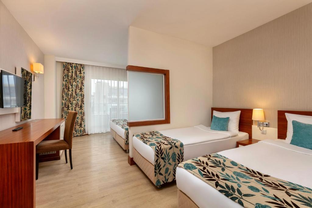 Moderns numurs ar divām gultām viesnīcā Greenwood Kemer Resort