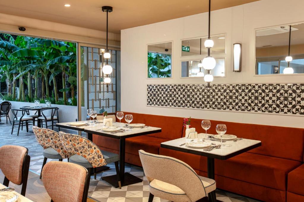 Greens and elegant dining area at Greenwood Kemer Resort.