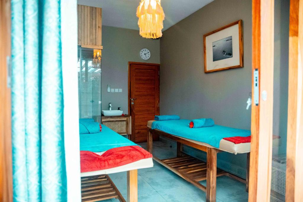SBH Monica Zanzibar spa telpa ar masāžas galdiem