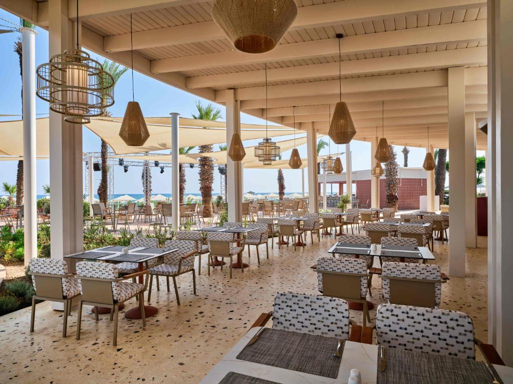 Paloma Grida restorāns ar skatu uz pludmali