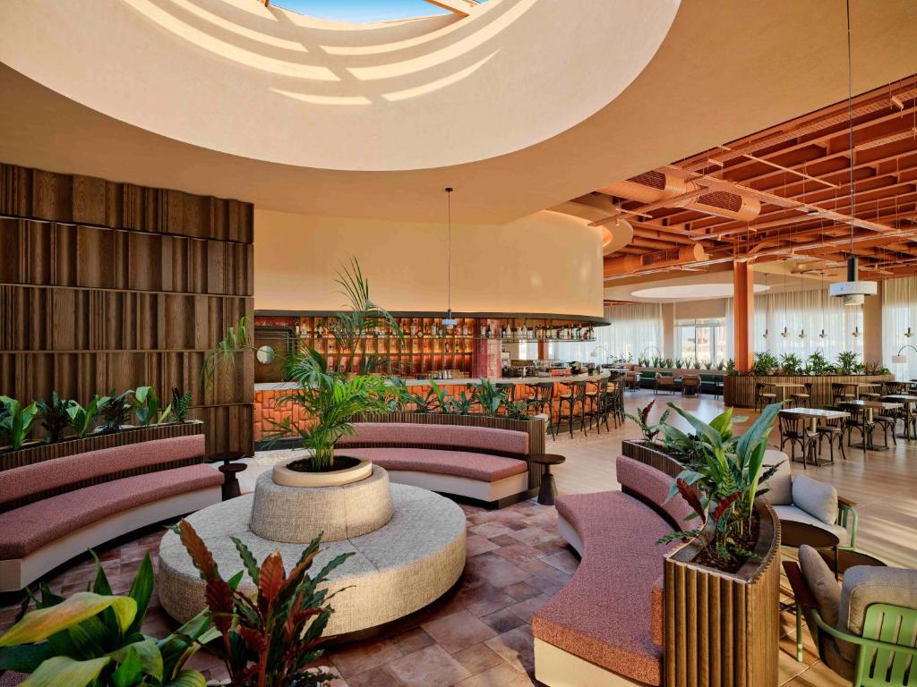 Paloma Grida viesnīcas stilīgs atpūtas laukums ar modernu interjeru