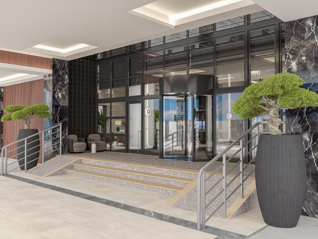 Annabella Diamond Hotel moderna ieeja ar elegantu dizainu un ainavu.