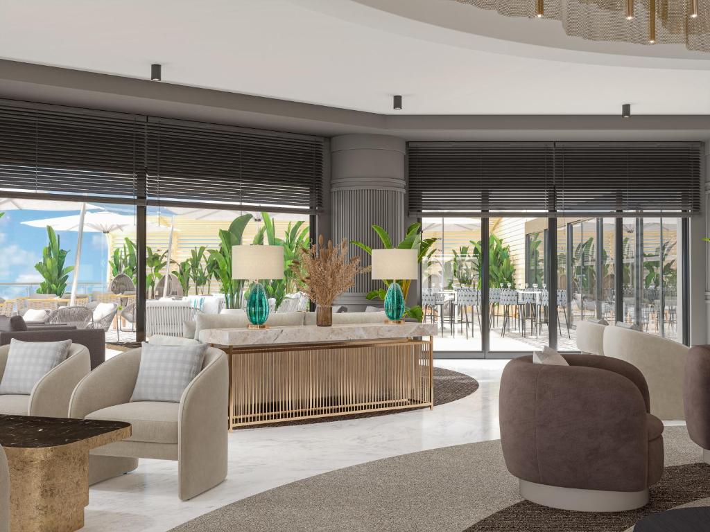 Mūsdienīgs atpūtas stūris Annabella Diamond Hotel ar skatu uz piekrasti.