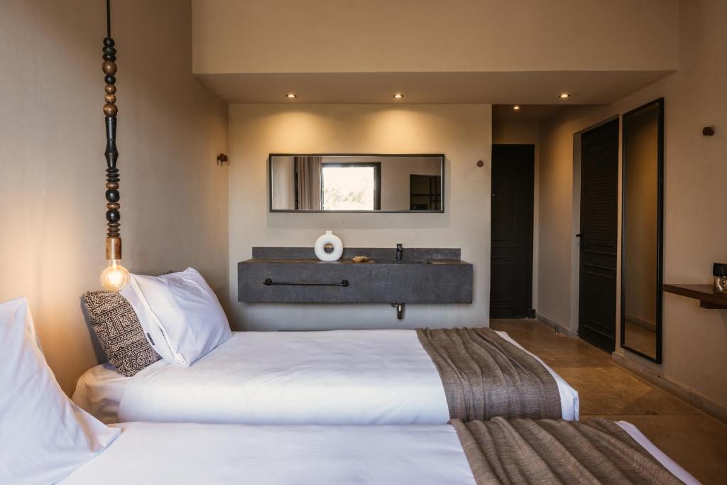 Moderns numurs ar divām gultām viesnīcā Cook's Club El Gouna