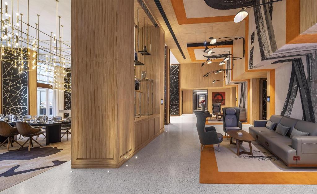 Andaz Dubai The Palm modern lobby and dining area.