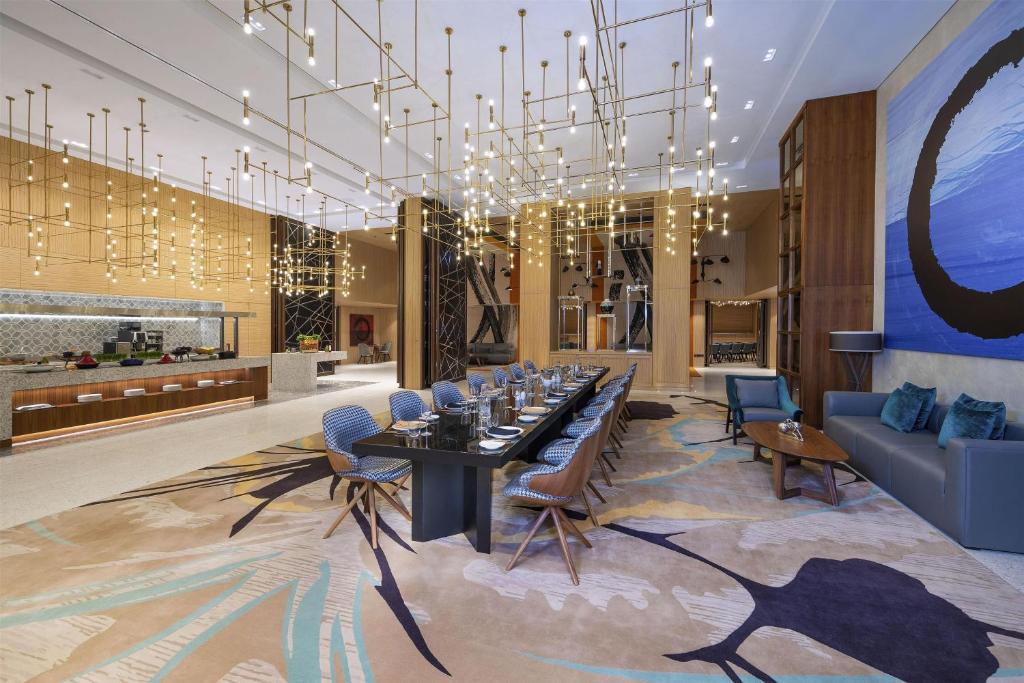 Andaz Dubai The Palm elegant dining area with modern decor.