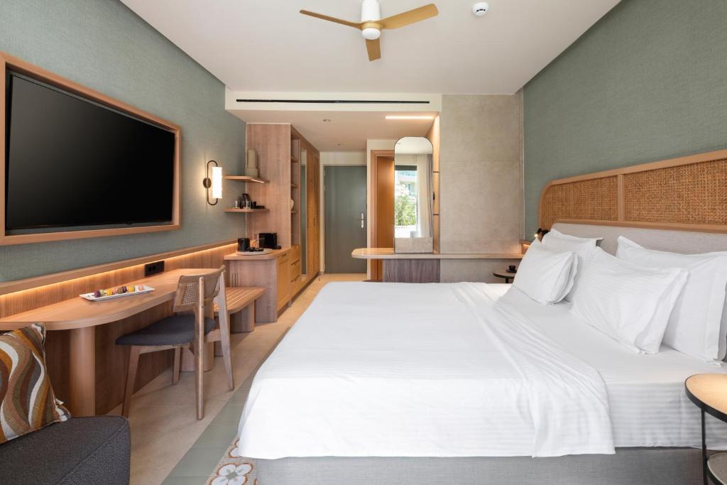 Moderns numurs ar ērtībām Sentido Apollo Palace.