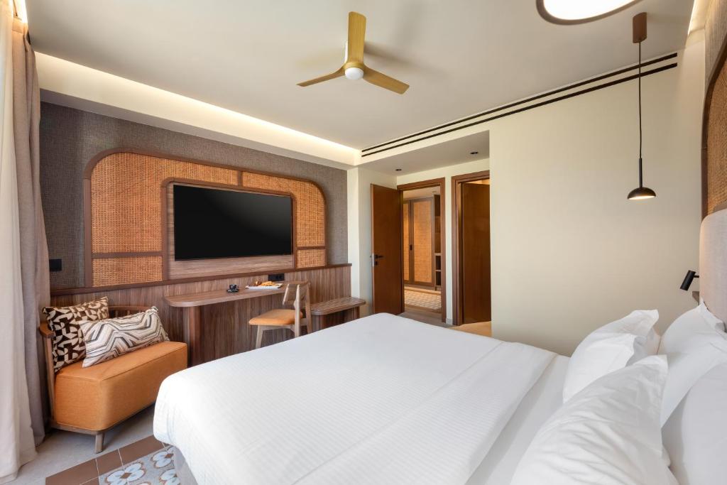 Elegants numurs viesnīcā Sentido Apollo Palace ar modernu interjeru.