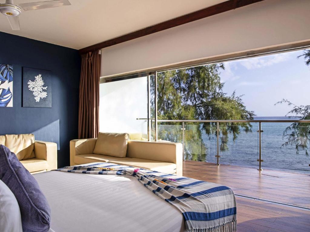 Nungwi Dreams by Mantis numurs ar skatu uz okeānu.