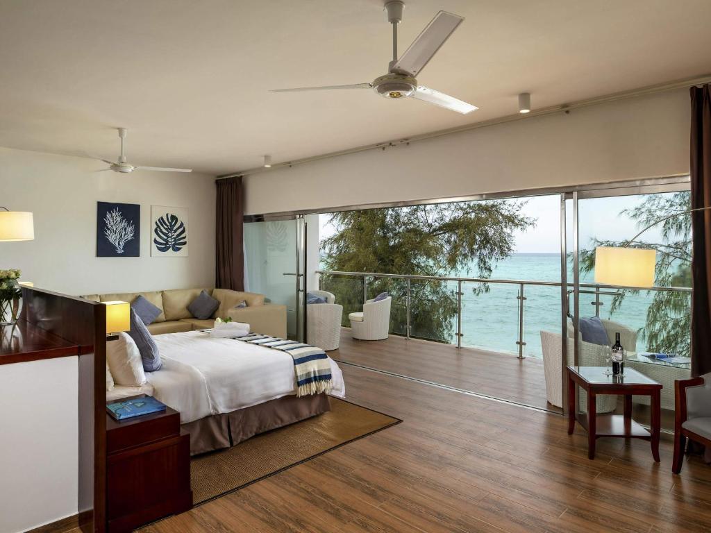 Nungwi Dreams by Mantis luksusa numurs ar skatu uz jūru