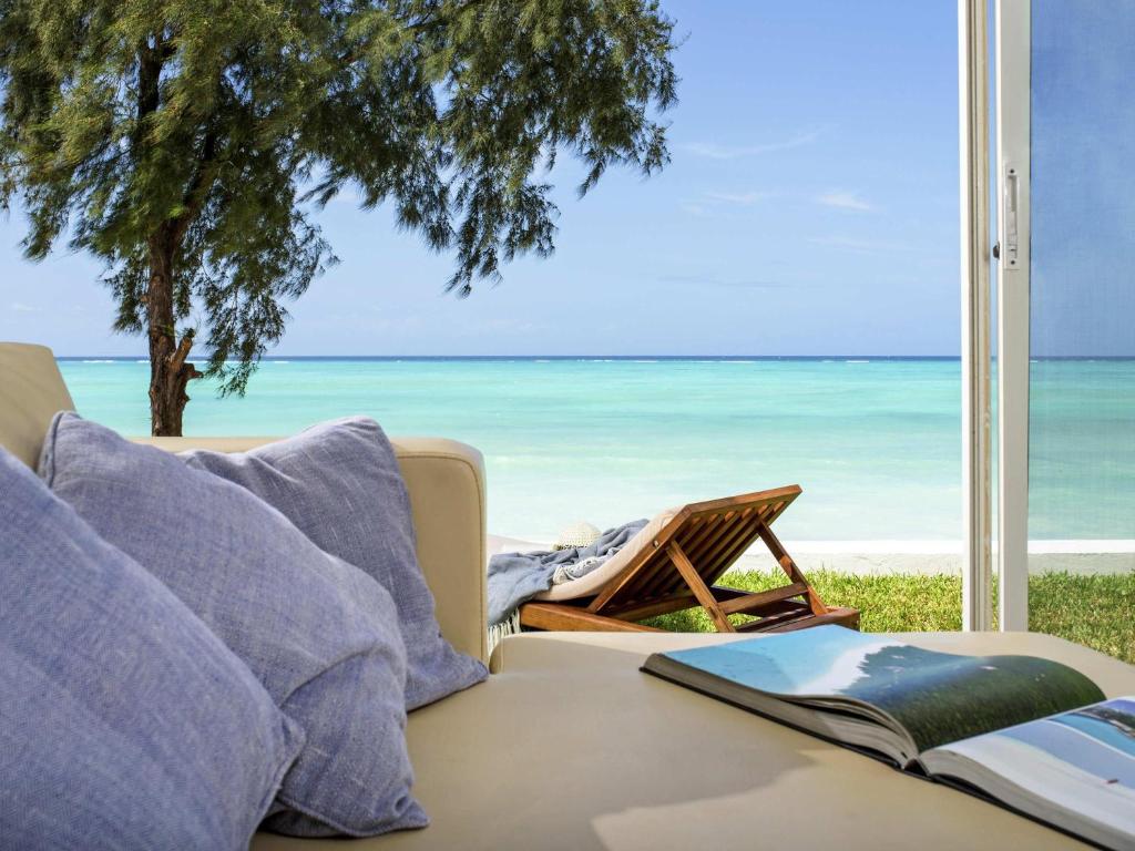 Nungwi Dreams by Mantis terase ar skatu uz okeānu