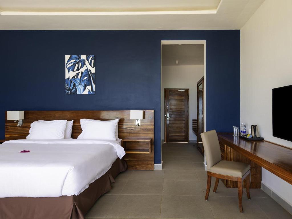 Numurs ar modernu interjeru viesnīcā Nungwi Dreams by Mantis.