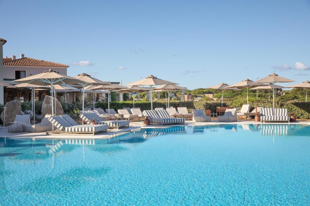 Mangia's Santa Teresa Sardinia poolside view with loungers