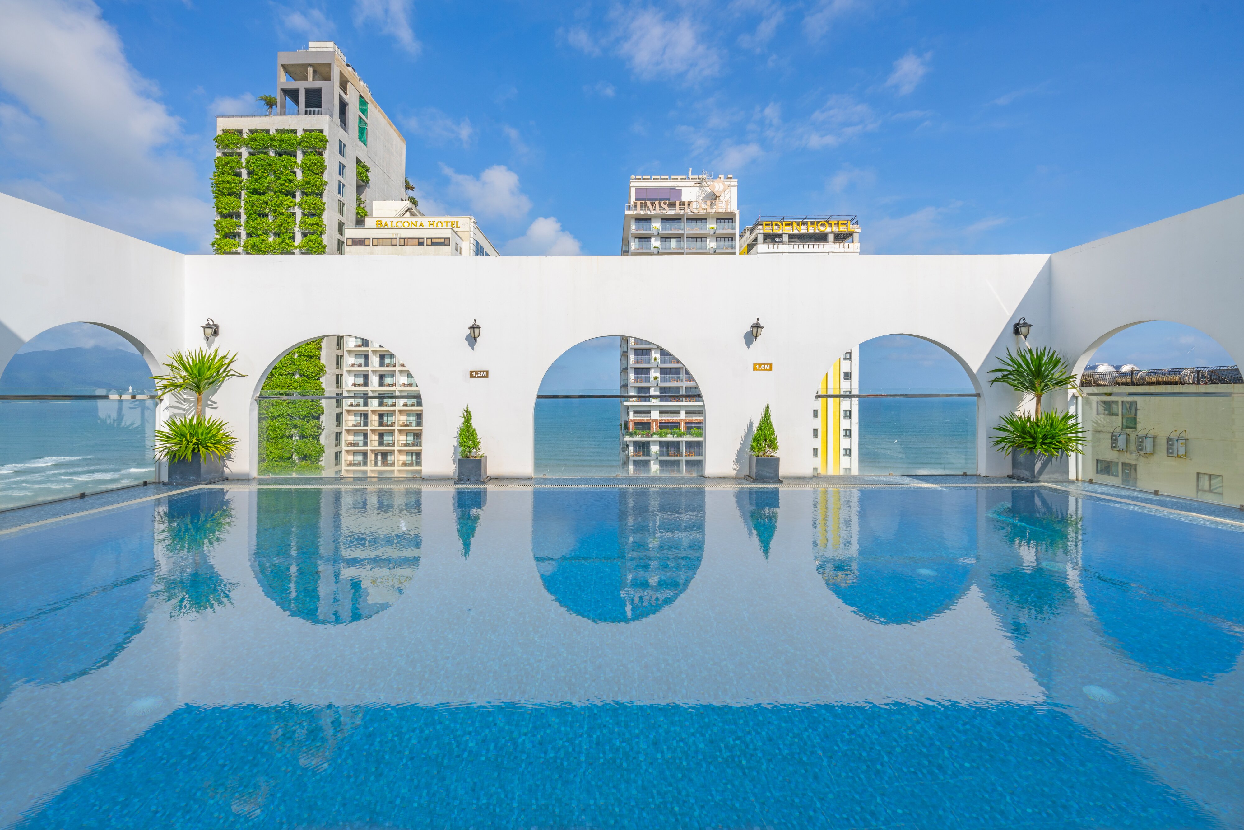 Golden Lotus panoramic view with beach and pools