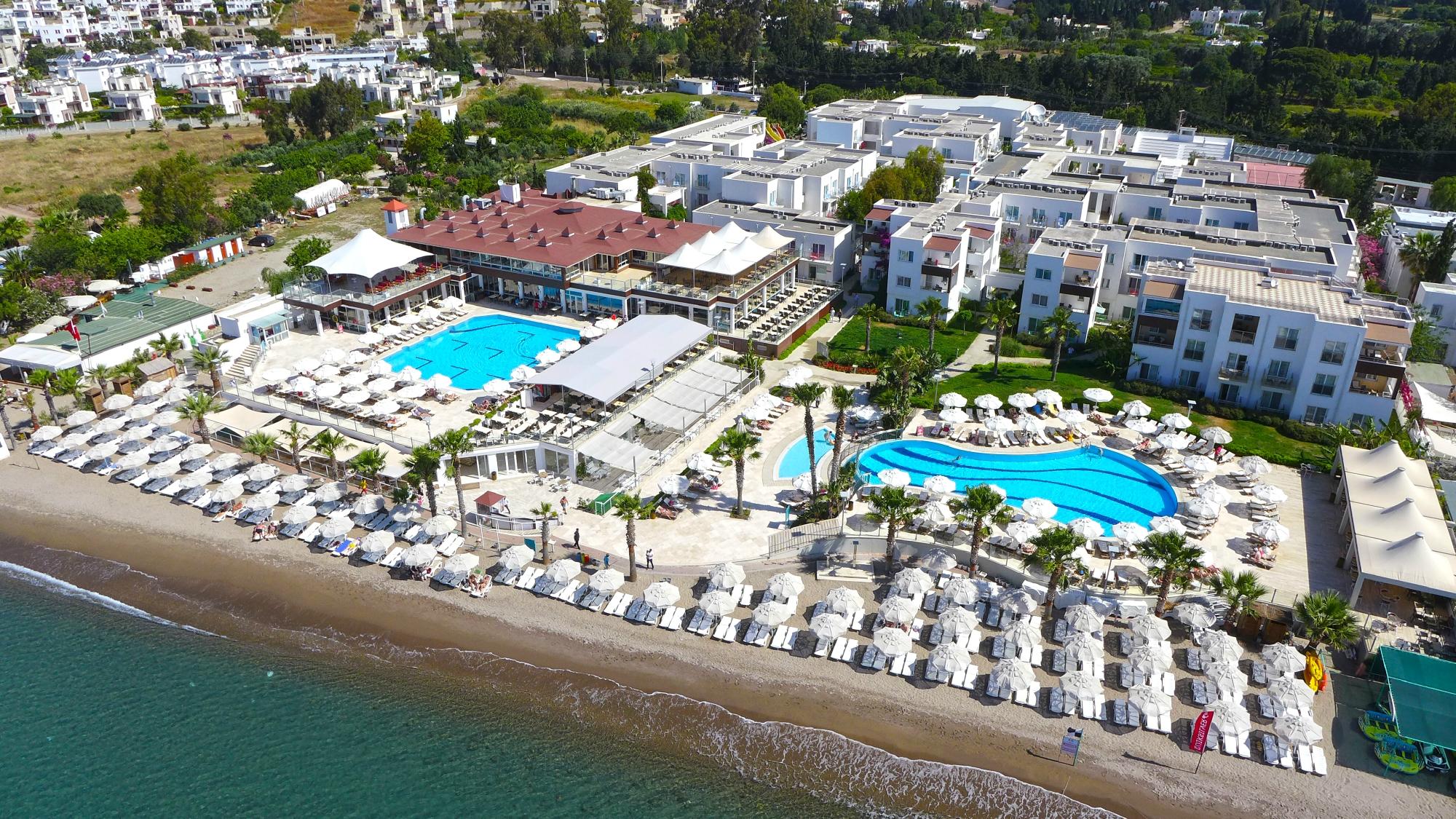 Armonia Holiday Village & Spa panoramic view with beach and pools