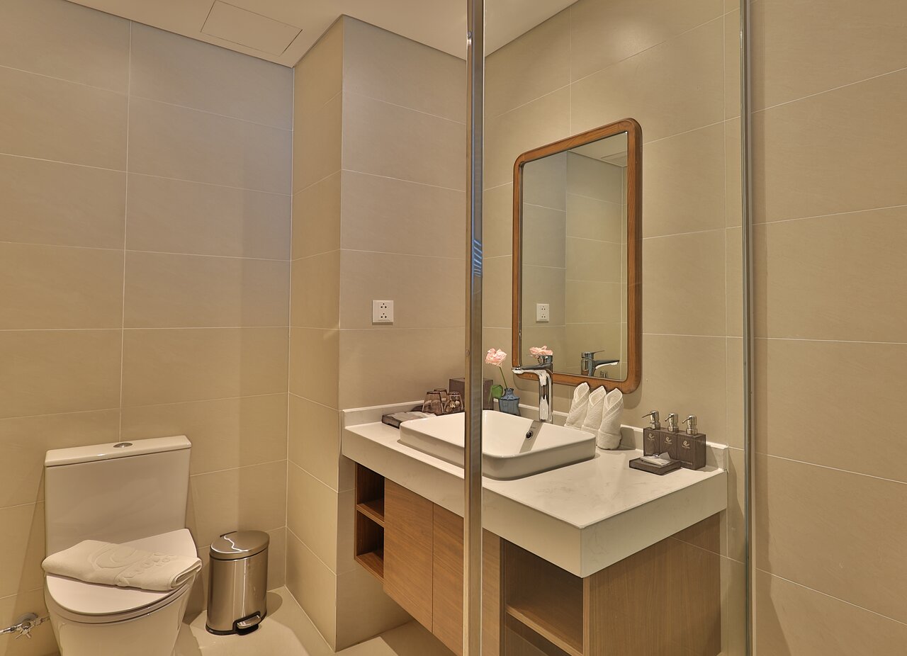 Vipol Muine Hotel & Spa modern bathroom with elegant sink and mirror.