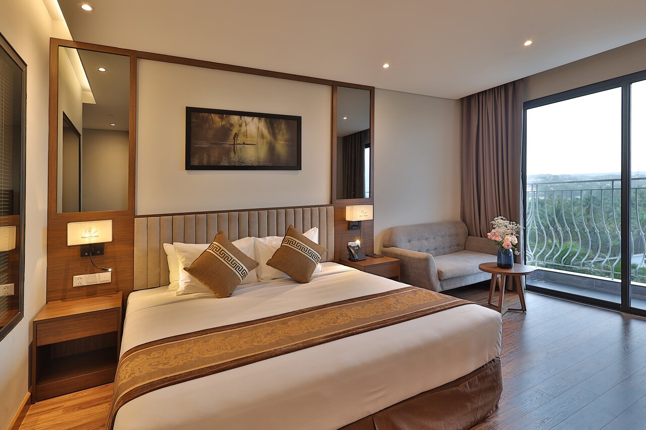 Vipol Muine Hotel & Spa elegant numurs ar skatu uz dārzu.