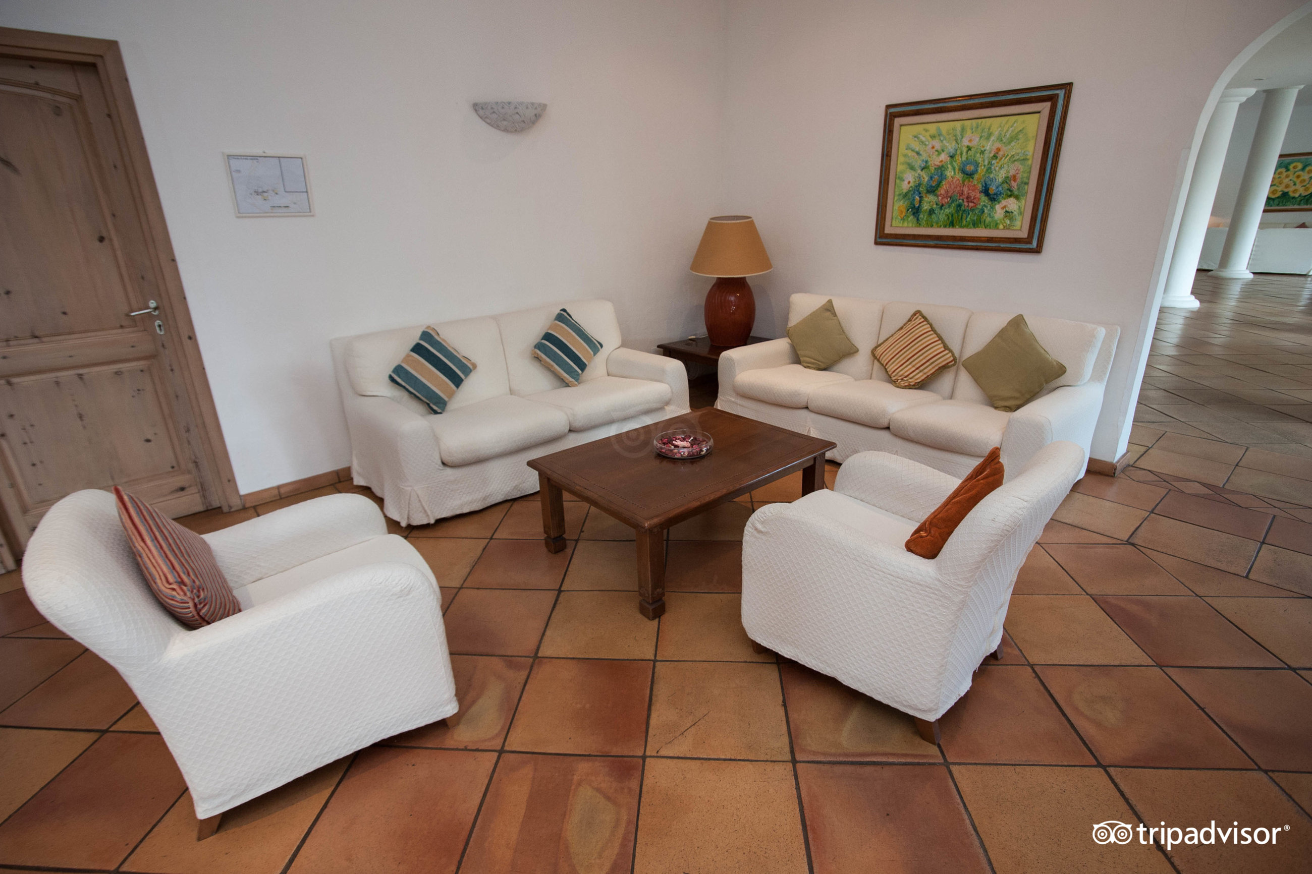 Hotel Stelle Marine viesnīcas atpūtas telpa ar ērtām dīvānām.