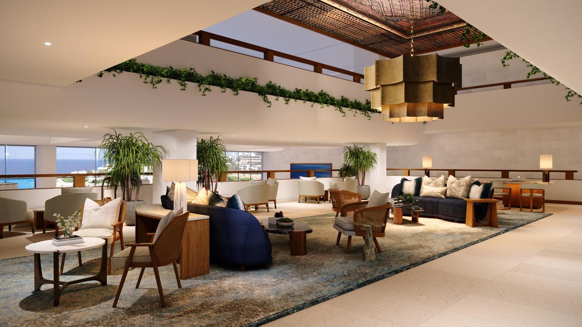 Porto Elounda Golf & Spa Resort plašais lobby bārs ar modernām mēbelēm, paklājiem un dizaina lustrām Elundā, Krētā