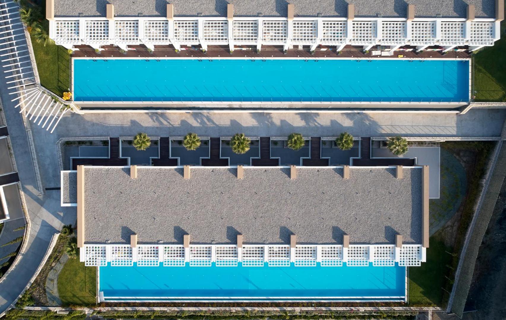 Princess Andriana Resort & Spa numuri ar tiešu piekļuvi baseinam un privātām terasēm Rodas salas kūrortā