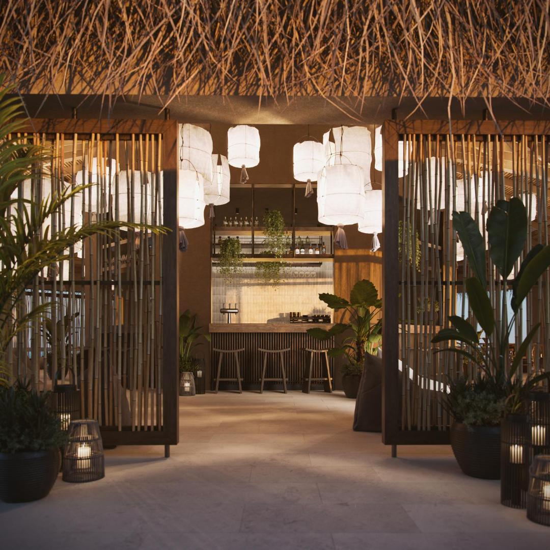 Helea Lifestyle Beach Resort vakara bārs ar bambusa dekorācijām, papīra laternām un mājīgu apgaismojumu Grieķijā