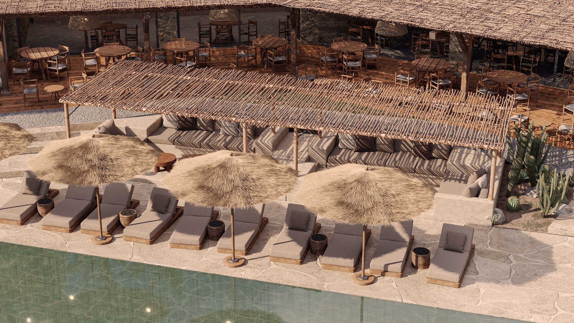 OKU Bodrum āra baseina zona ar mīkstiem zviļņiem, salmu saulessargiem un atpūtas terasi zem koka nojumes Bodrumas piekrastē