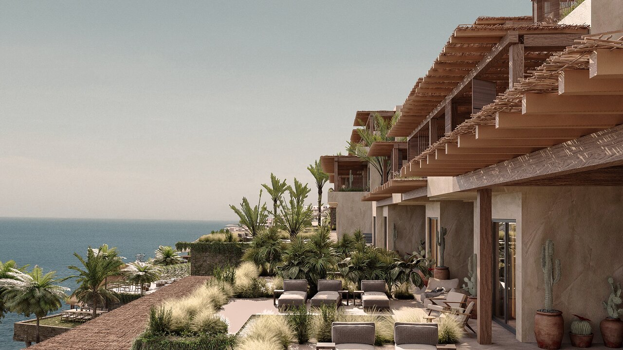 OKU Bodrum numuru terases ar koka nojumēm, mīkstiem zviļņiem un skatu uz Egejas jūru palmu ielenkumā