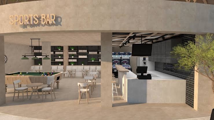 Nana Royal Premium Resort sporta bārs ar biljarda galdu, spēļu automātiem un bāra leti modernā, gaišā interjerā