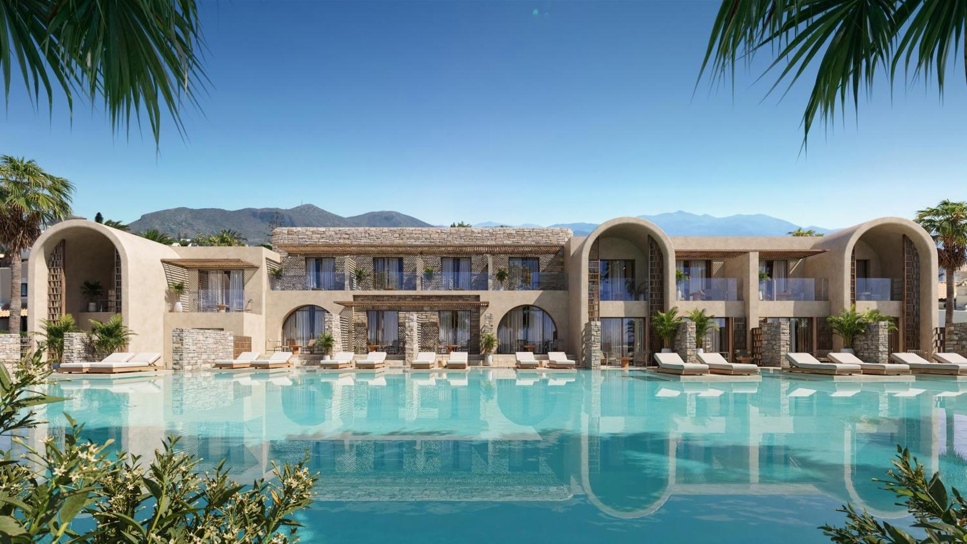 Nana Royal Premium Resort modernā arhitektūra ar lielu āra baseinu, sauļošanās krēsliem un kalnu ainavu fonā saulainā dienā